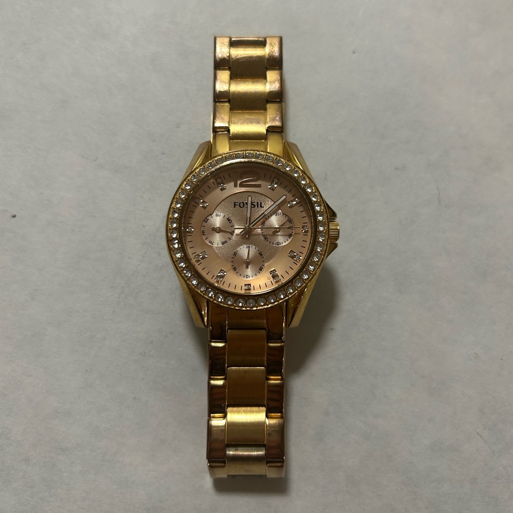 Gold fossil watch